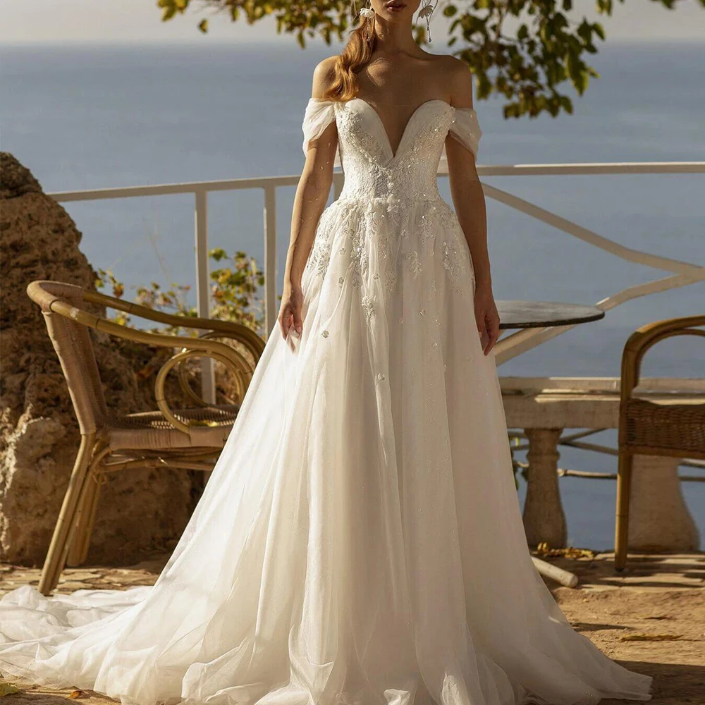 Exquisite Wedding Dresses V-Neck Off The Shoulder Lace Up Backless Bride Gown Lace Applique Court Train A-Line Vestido De Noiva 
Exquisite Wedding Dresses V-Neck Off The Shoulder Lace Up Backless Bride Gown Lace Applique Court Train A-Line Vestido De Noiva