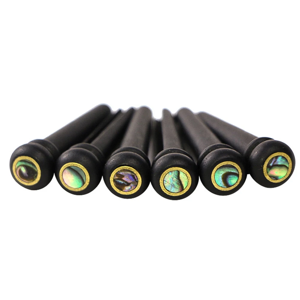 6Pcs/Set Acoustic Guitar Ebony Bridge Pins Abalone Dot Inlay Brass Circle Skirt Eliminating Frequency Sonic Boom Nice Gift
6Pcs/Set Acoustic Guitar Ebony Bridge Pins Abalone Dot Inlay Brass Circle Skirt Eliminating Frequency Sonic Boom Nice Gift