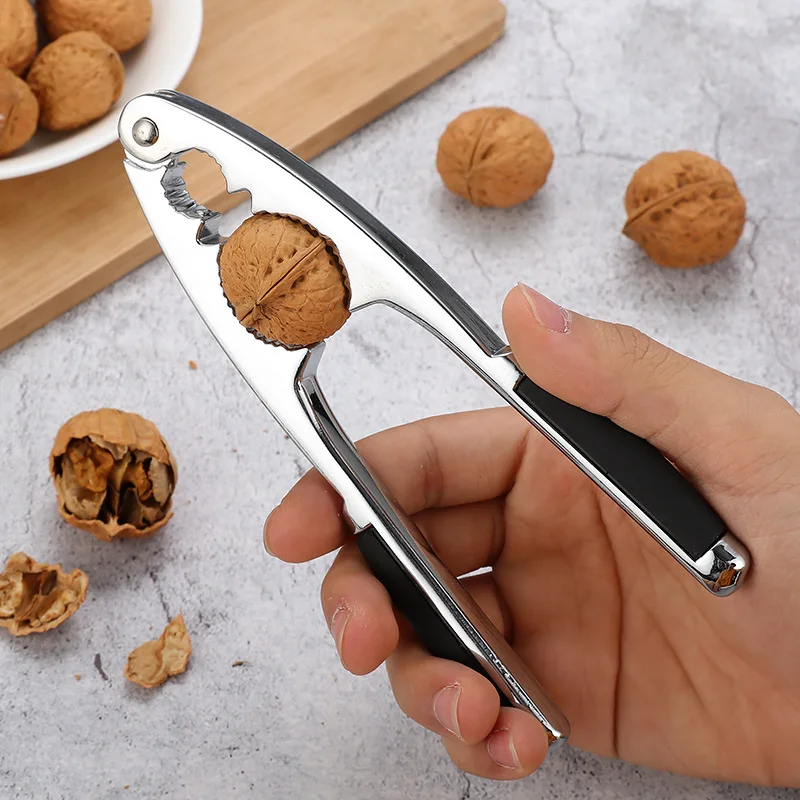 Pliers Stainless Steel Clip Walnut Cracker Melon Seeds Clamp Shell Separator Nut Pliers Snacks household gadgets
Pliers Stainless Steel Clip Walnut Cracker Melon Seeds Clamp Shell Separator Nut Pliers Snacks household gadgets