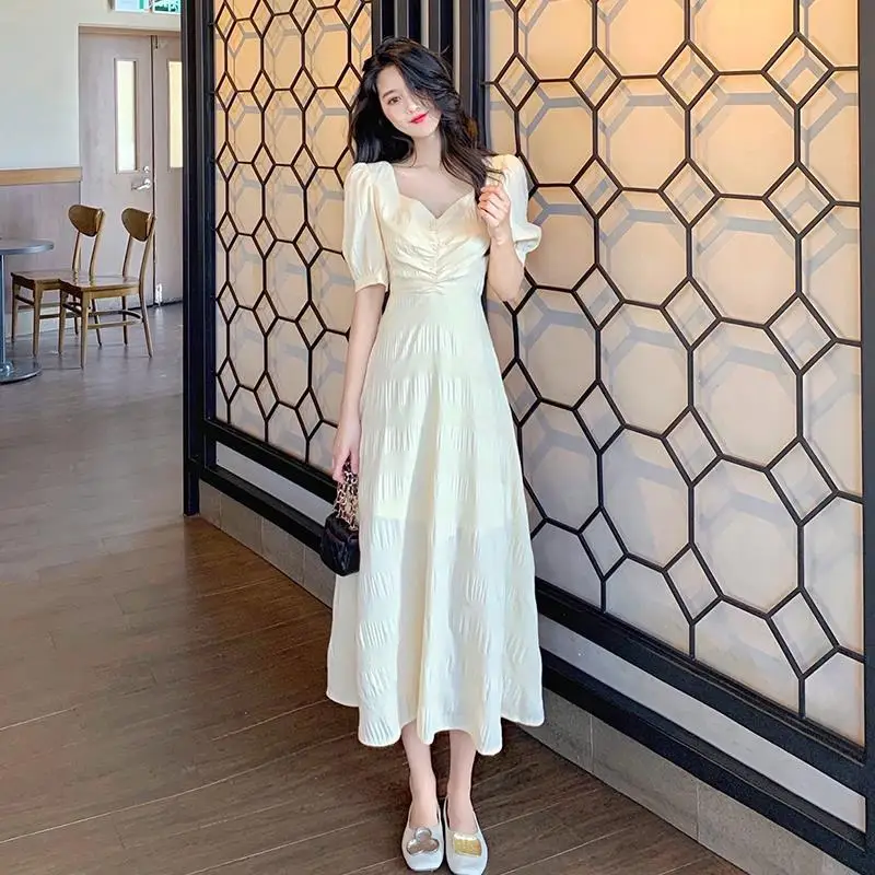 Summer New Backless Loose Ladies Dresses V Neck Short Sleeve Solid Color Pleated Midi Dress Temperament Elegant Women Clothing
Summer New Backless Loose Ladies Dresses V Neck Short Sleeve Solid Color Pleated Midi Dress Temperament Elegant Women Clothing