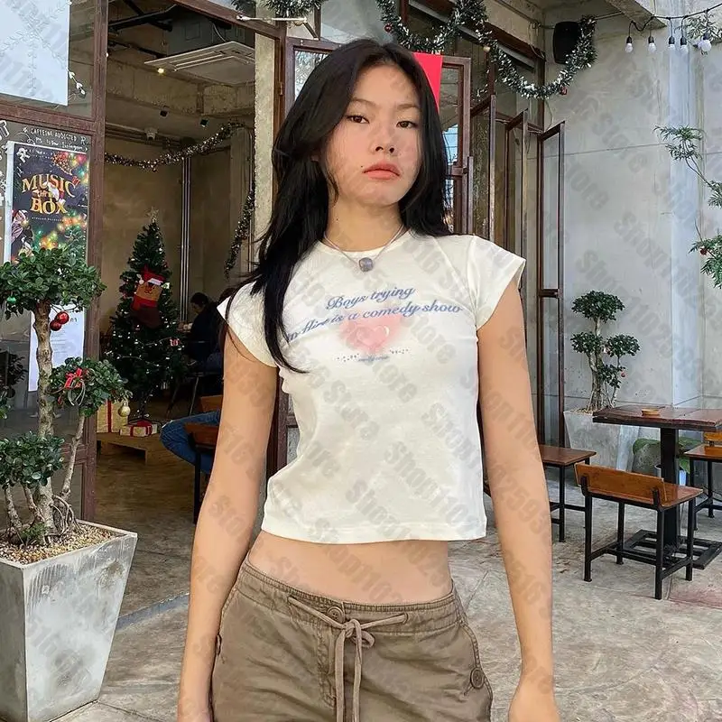 Aesthetic Kawaii women T-shirt Letter Heart print Korean Crop tops Summer short sleeve Tees kpop streetwear Y2K Clothes lady 90s
Aesthetic Kawaii women T-shirt Letter Heart print Korean Crop tops Summer short sleeve Tees kpop streetwear Y2K Clothes lady 90s