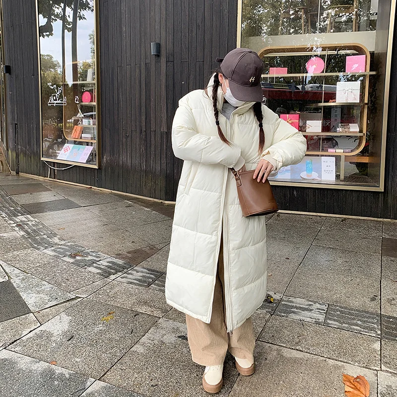 Thickened warm ladies down in winter cotton-padded jacket long fashion loose stand-up collar knee-length cotton-padded coat.
Thickened warm ladies down in winter cotton-padded jacket long fashion loose stand-up collar knee-length cotton-padded coat.