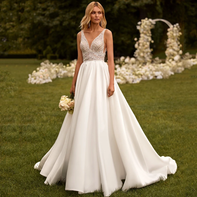 Eightree White A-Line Wedding Dresses V-Neck Sequines Dress With Bow Boho Beach Backless Wedding Evening Prom Gowns Custom Size
Eightree White A-Line Wedding Dresses V-Neck Sequines Dress With Bow Boho Beach Backless Wedding Evening Prom Gowns Custom Size