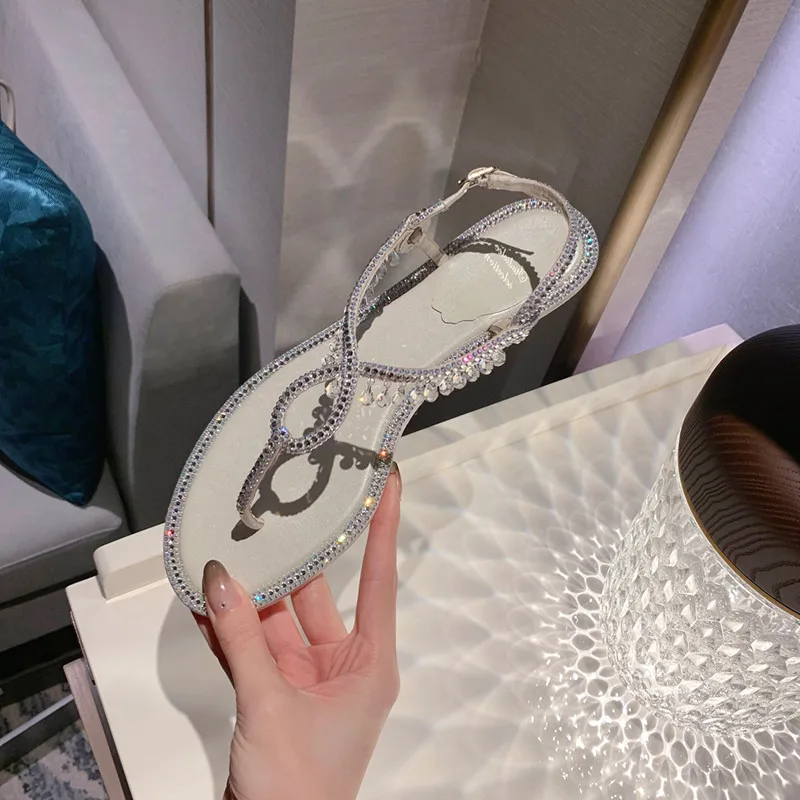 Сандалии UVRCOS женские на плоской подошве, пикантные пляжные босоножки в богемном стиле, с кристаллами и кисточками, серебристые 
Сандалии UVRCOS женские на плоской подошве, пикантные пляжные босоножки в богемном стиле, с кристаллами и кисточками, серебристые