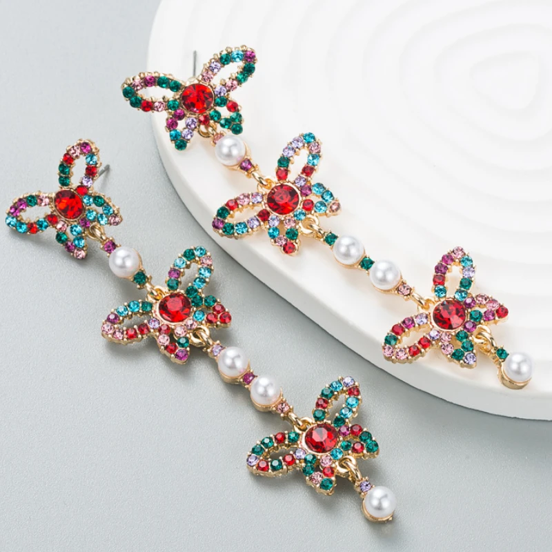 Fashion Rhinestone Long Pearl Butterfly Earrings Personality Earrings Wholesale
Fashion Rhinestone Long Pearl Butterfly Earrings Personality Earrings Wholesale