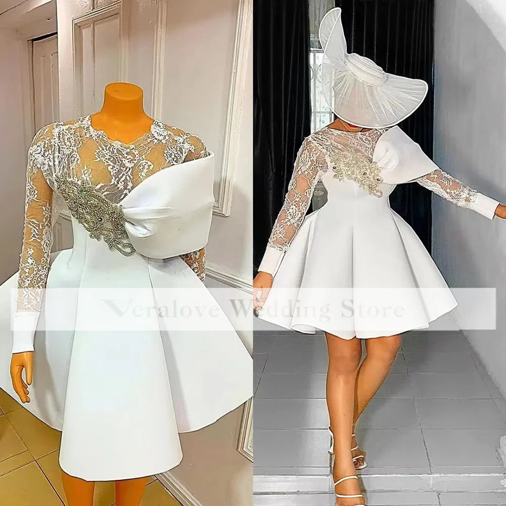 Свадебное платье Aso Ebi с прозрачным воротником, иллюзионное Короткое свадебное платье с длинными рукавами, кружевное платье с аппликацией
Свадебное платье Aso Ebi с прозрачным воротником, иллюзионное Короткое свадебное платье с длинными рукавами, кружевное платье с аппликацией