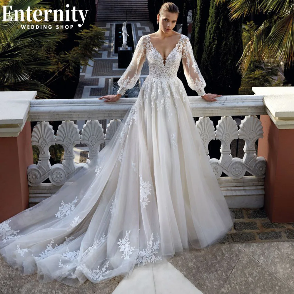 Romantic Long Puffy Sleeves Wedding Dress V Neck A Line Bridal Gown Lace Appliques Open Back Court Train Vestidos De Novia
Romantic Long Puffy Sleeves Wedding Dress V Neck A Line Bridal Gown Lace Appliques Open Back Court Train Vestidos De Novia