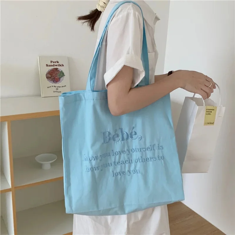 2023 New Embroidery Women's Canvas Bag Korean Style Girl Student Shoulder Bag Large Capacity Letter Buckle Shopping Bags
2023 New Embroidery Women's Canvas Bag Korean Style Girl Student Shoulder Bag Large Capacity Letter Buckle Shopping Bags