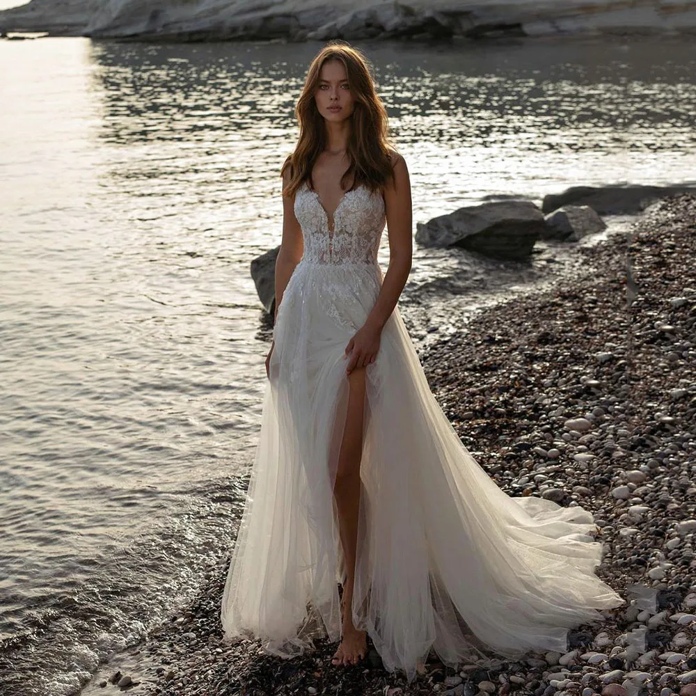 

Boho Sheer Lace Wedding Dress with Side Slit 2023 V Neck Spaghetti Straps Appliques Illusion Bodice Backless Beach Bridal Gowns