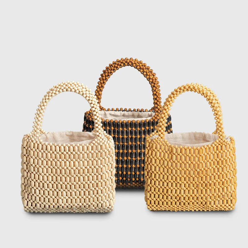 New Wood Bead Woven Bags Vintage Hand-Woven Hollowed Out Seaside Holiday Tote Square Women Bag
New Wood Bead Woven Bags Vintage Hand-Woven Hollowed Out Seaside Holiday Tote Square Women Bag
