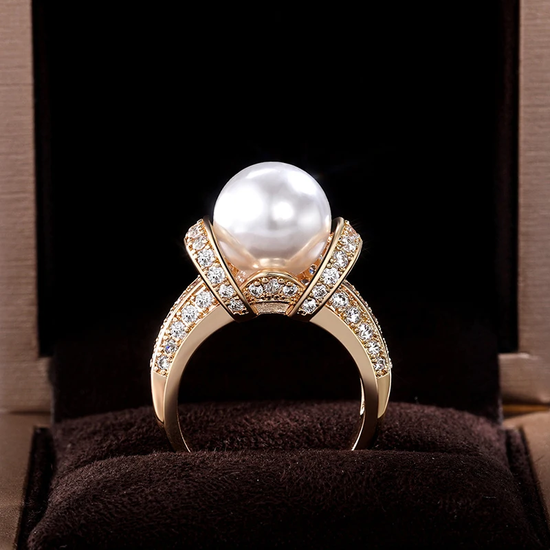 New Vintage Gold Plated Pearl Engagement Rings For Women Shine White CZ Stone Inlay Fashion Jewelry Elegant Wedding Party Gift
New Vintage Gold Plated Pearl Engagement Rings For Women Shine White CZ Stone Inlay Fashion Jewelry Elegant Wedding Party Gift