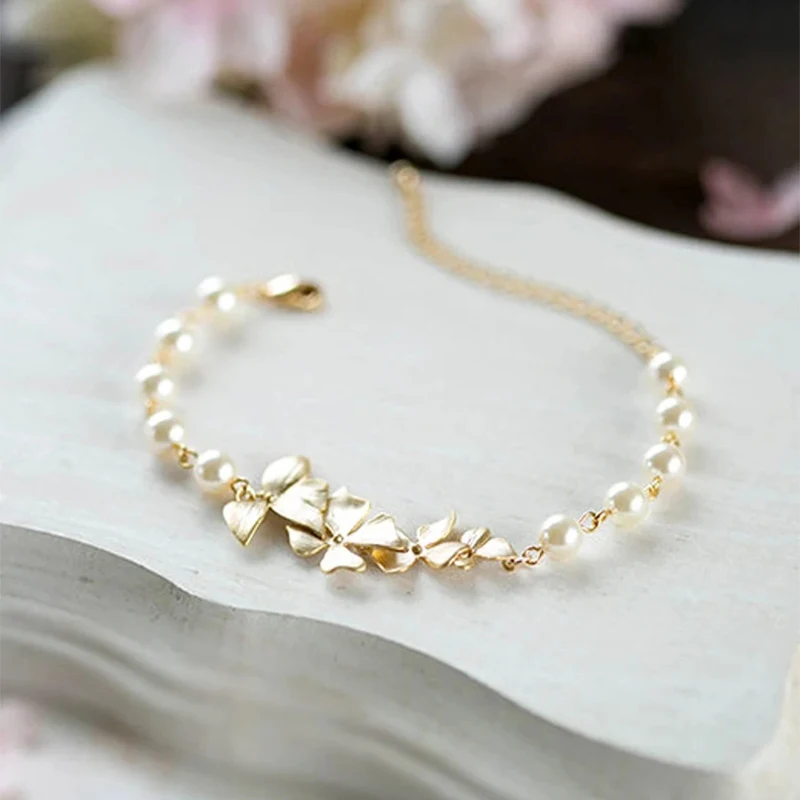 Bridal Bracelet Bridesmaid Bracelet Gold Orchid Flower Cream Ivory White Pearl Bracelet Gold Wedding Bracelet Flower Girl
Bridal Bracelet Bridesmaid Bracelet Gold Orchid Flower Cream Ivory White Pearl Bracelet Gold Wedding Bracelet Flower Girl