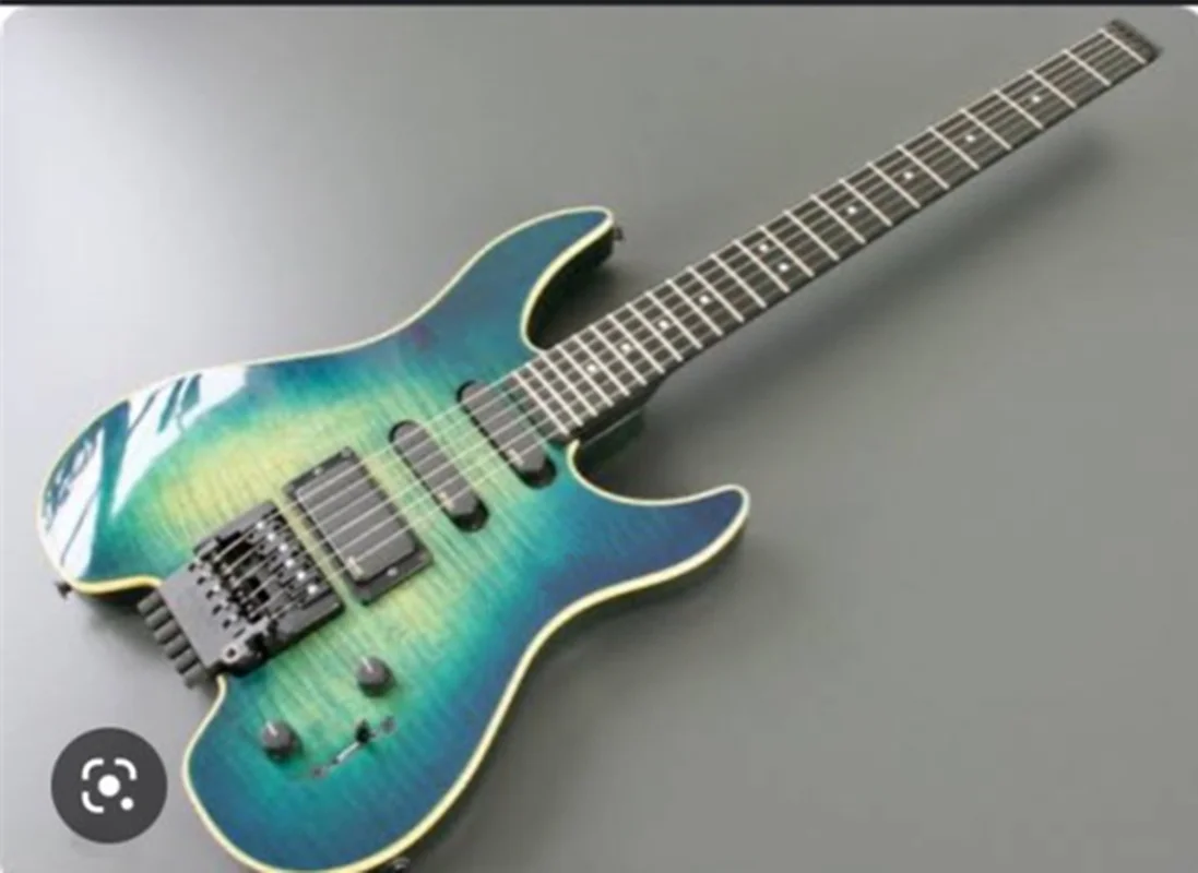 Headless Electric Guitar Blue Guitar White Binding Fixed Bridge HH Pickups Basswood Body Flamed Maple Top Ebony fingerboard
Headless Electric Guitar Blue Guitar White Binding Fixed Bridge HH Pickups Basswood Body Flamed Maple Top Ebony fingerboard