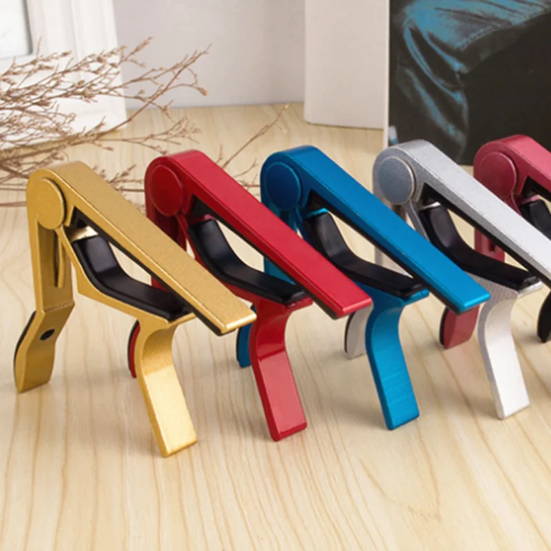 Hot Sale 1PC 7Colors Classic Tone Adjusting Guitar Parts Aluminium Metal Guitar Capo Guitar Quick Change Clamp Key Acoustic
Hot Sale 1PC 7Colors Classic Tone Adjusting Guitar Parts Aluminium Metal Guitar Capo Guitar Quick Change Clamp Key Acoustic