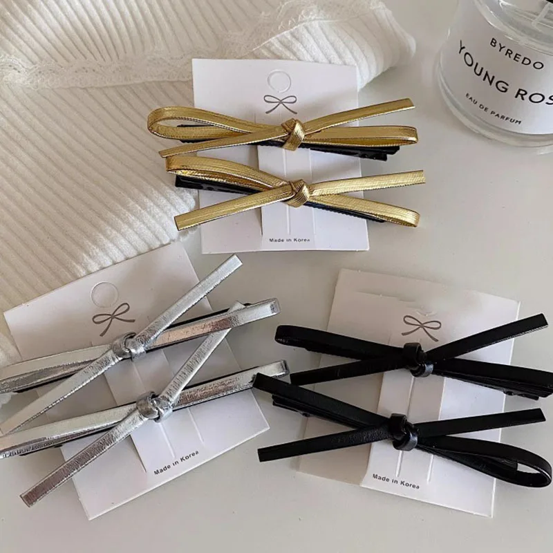2023 PU Leather Bow Hairpin Hair Clip Fashion Design Personality Delicate Korea Sweet Cool y2k Girls Bobby Pin Hair Accessories
2023 PU Leather Bow Hairpin Hair Clip Fashion Design Personality Delicate Korea Sweet Cool y2k Girls Bobby Pin Hair Accessories