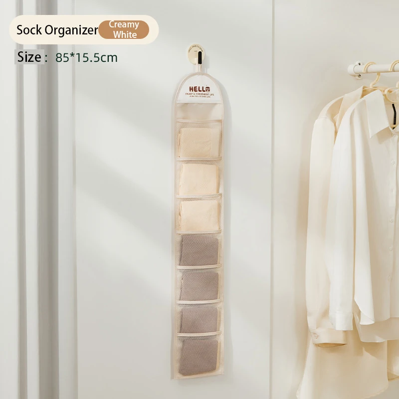 Подвесная сумка-органайзер для носков с 7 сетками, сумки для хранения аксессуаров для волос для головных уборов, ювелирных изделий, настенный органайзер для мелочей для шкафа
Подвесная сумка-органайзер для носков с 7 сетками, сумки для хранения аксессуаров для волос для головных уборов, ювелирных изделий, настенный органайзер для мелочей для шкафа