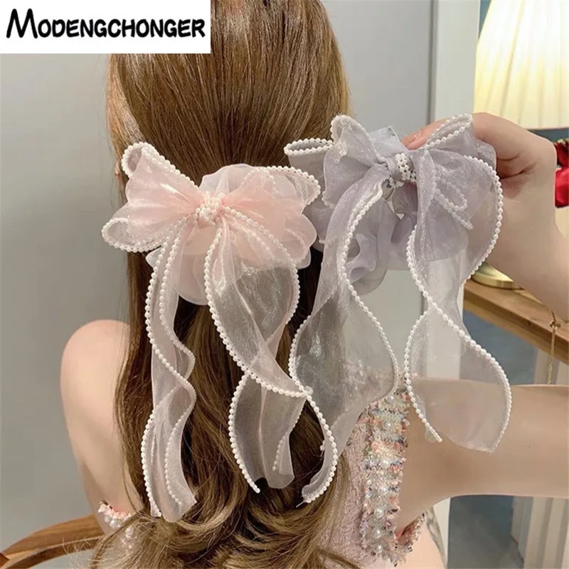 2022Spring Fashion Pearl Bow Hair Scrunchie Organza Hair Rope For Women Hair Tie Long Ribbon Ponytail Headwear Hair Accessories
2022Spring Fashion Pearl Bow Hair Scrunchie Organza Hair Rope For Women Hair Tie Long Ribbon Ponytail Headwear Hair Accessories