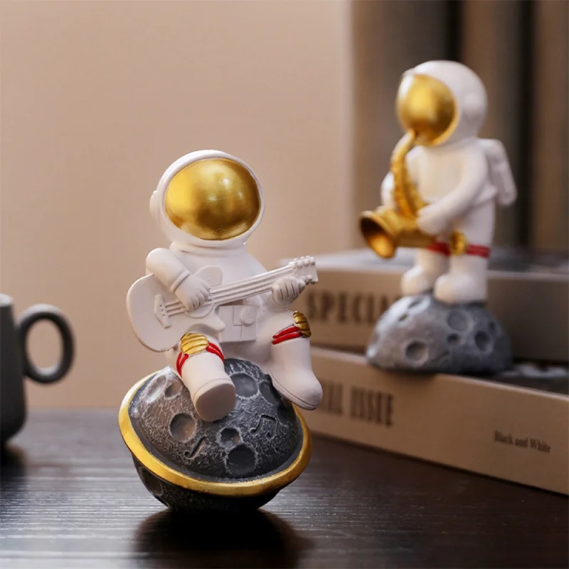 

Nordic Astronaut Statue Resin Cosmonaut Figurine Play Music Modern Home Decoration Spaceman with Moon Sculpture desktop Ornament