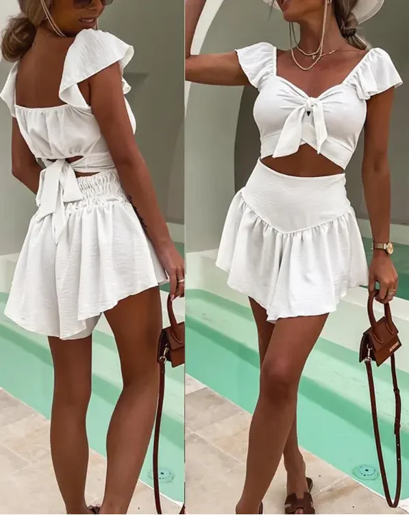 2022 new Sexy V Neck Sleeveless Women Tied Detail Crop Top & Shirred Shorts Set 2022 Summer Fashion New High Waist Short Dress
2022 new Sexy V Neck Sleeveless Women Tied Detail Crop Top & Shirred Shorts Set 2022 Summer Fashion New High Waist Short Dress