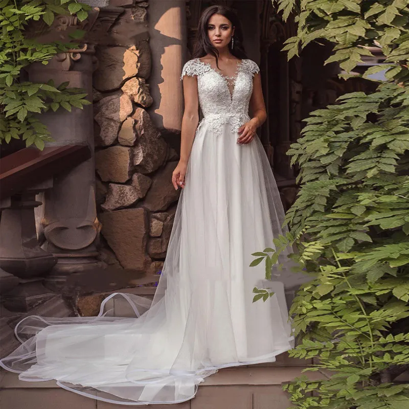 Luxurious Simple 2022 Boho Tulle Wedding Dress Simple V Neck Cap Sleeves A Line Appliqué Lace Up Backless Bridal Dress Custom
Luxurious Simple 2022 Boho Tulle Wedding Dress Simple V Neck Cap Sleeves A Line Appliqué Lace Up Backless Bridal Dress Custom