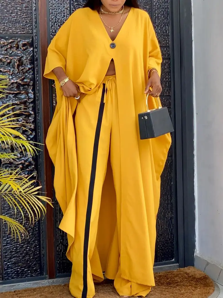 2023 Two Piece Suit Sets Women Fashion Solid Color Pants Sets V Neck Long Sleeve Slit Longline Top & Contrast Paneled Pants Set
2023 Two Piece Suit Sets Women Fashion Solid Color Pants Sets V Neck Long Sleeve Slit Longline Top & Contrast Paneled Pants Set