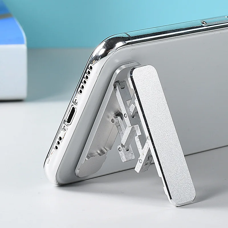 Invisible Portable Foldable Mobile Phone Holder Stand Bracket Fold Alloy Desktop Adjustable Angle Support For All Model phone
Invisible Portable Foldable Mobile Phone Holder Stand Bracket Fold Alloy Desktop Adjustable Angle Support For All Model phone