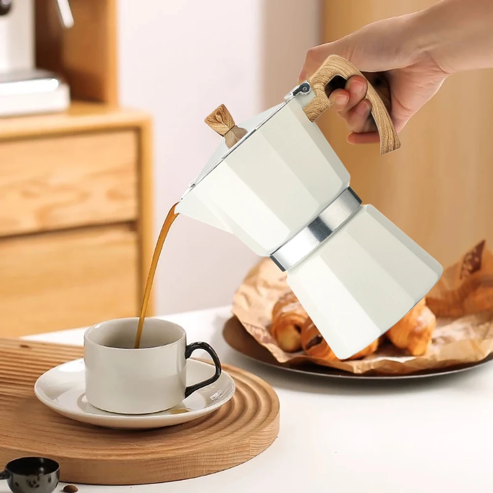 150ml/300ml Stovetop Espresso Maker 3-6 Cups Moka Pot Classic Coffee Maker Aluminum Barista Coffee Brewing Kettle Accessories
150ml/300ml Stovetop Espresso Maker 3-6 Cups Moka Pot Classic Coffee Maker Aluminum Barista Coffee Brewing Kettle Accessories