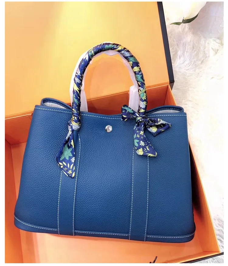 Новинка 2022, садовая сумка, женская модная сумка-тоут из искусственной кожи с верхним слоем телячьей кожи 
Новинка 2022, садовая сумка, женская модная сумка-тоут из искусственной кожи с верхним слоем телячьей кожи