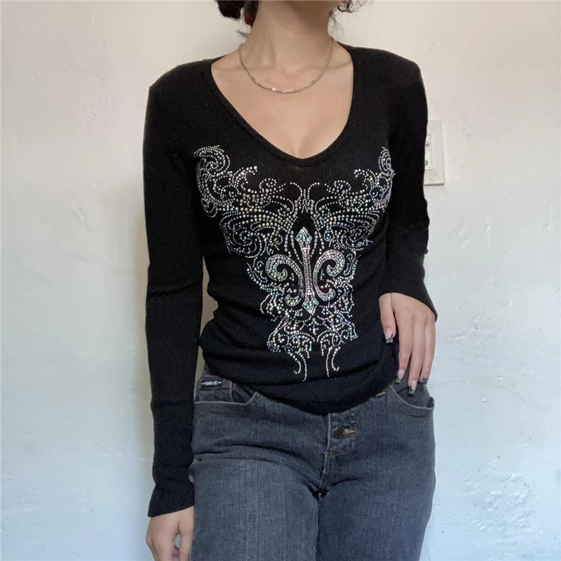 Graphic Rhinestone Top 2000s Women Cross Wings Print V Neck Long Sleeve T Shirts Cyber y2k Clothes Gothic Fairy Grunge Clothing
Graphic Rhinestone Top 2000s Women Cross Wings Print V Neck Long Sleeve T Shirts Cyber y2k Clothes Gothic Fairy Grunge Clothing