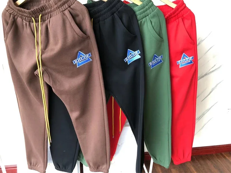 New Triangle Rhude Embroidery Logo Sweatpants Men Women Drawstring Pants Trousers Kanye West
New Triangle Rhude Embroidery Logo Sweatpants Men Women Drawstring Pants Trousers Kanye West