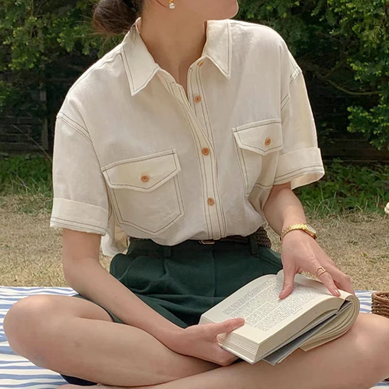 Clothland Women Elegant Pocket Short Sleeve Blouse Single Breasted White Navy Shirt Retro Chic Tops Blusa DA481
Clothland Women Elegant Pocket Short Sleeve Blouse Single Breasted White Navy Shirt Retro Chic Tops Blusa DA481