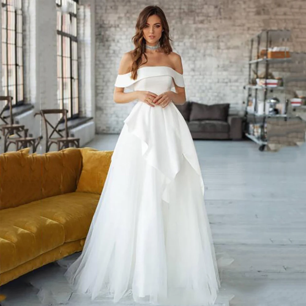 Modern Bride Gowns Boat Neck Short Sleeve Off The Shoulder Lace Up Wedding Dresses Tulle A-Line Floor Length Vestido De Noiva 
Modern Bride Gowns Boat Neck Short Sleeve Off The Shoulder Lace Up Wedding Dresses Tulle A-Line Floor Length Vestido De Noiva