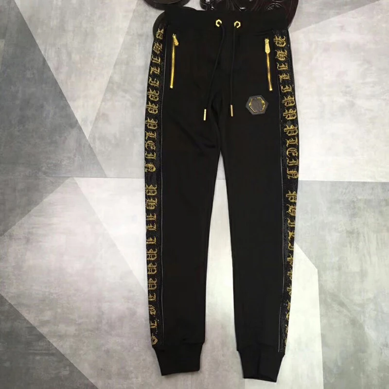 Sweatpants Men side gold lettering hot drilling fashion pure cotton high street hip-hop spring and autumn pantalones hombre ins
Sweatpants Men side gold lettering hot drilling fashion pure cotton high street hip-hop spring and autumn pantalones hombre ins