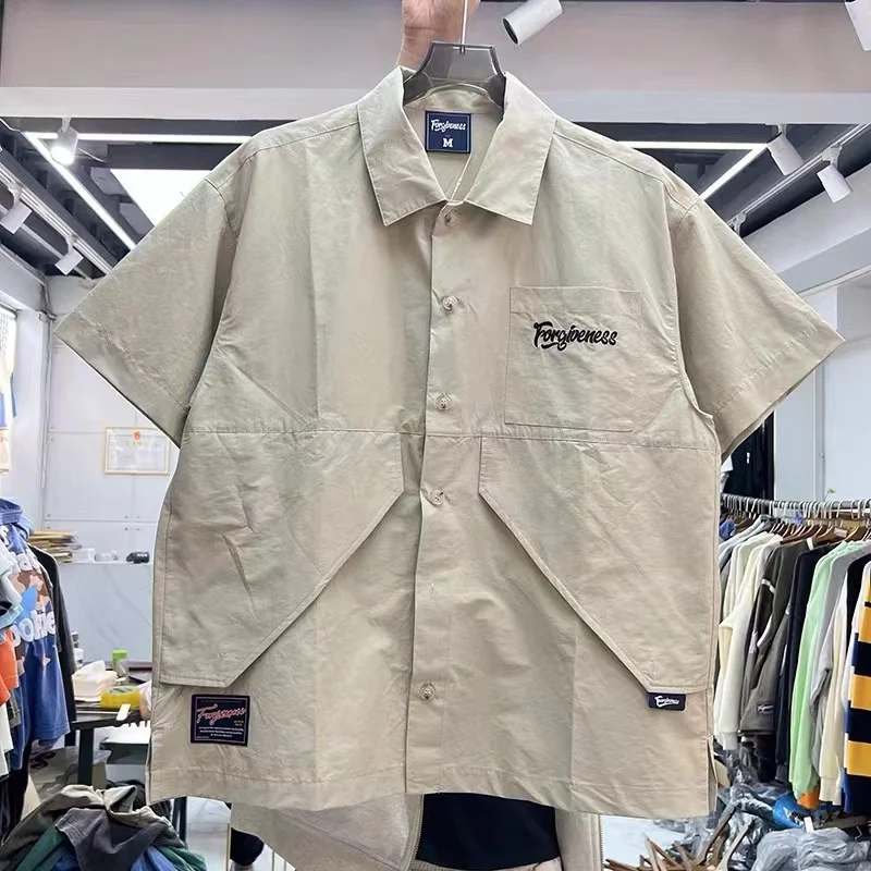Solid color collocation large pocket decorated short-sleeved lapel shirt short-sleeved shirt
Solid color collocation large pocket decorated short-sleeved lapel shirt short-sleeved shirt