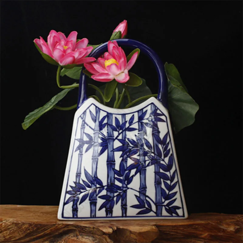 Retro New Chinese Decor Flower Vase Creative Literature and Art Hand Painted Blue and White Ceramics Home Decoration Craft Vases
Retro New Chinese Decor Flower Vase Creative Literature and Art Hand Painted Blue and White Ceramics Home Decoration Craft Vases