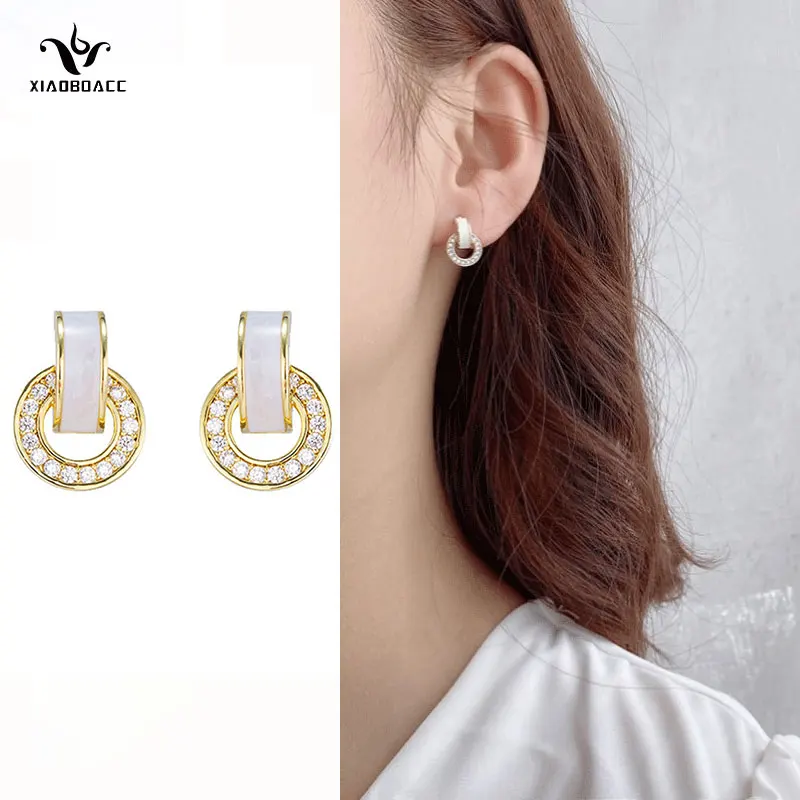 XiaoboACC 925 Silver Needle Zircon Earrings for Woman Fashion Hypoallergenic Circle Stud Earrings Jewellery
XiaoboACC 925 Silver Needle Zircon Earrings for Woman Fashion Hypoallergenic Circle Stud Earrings Jewellery