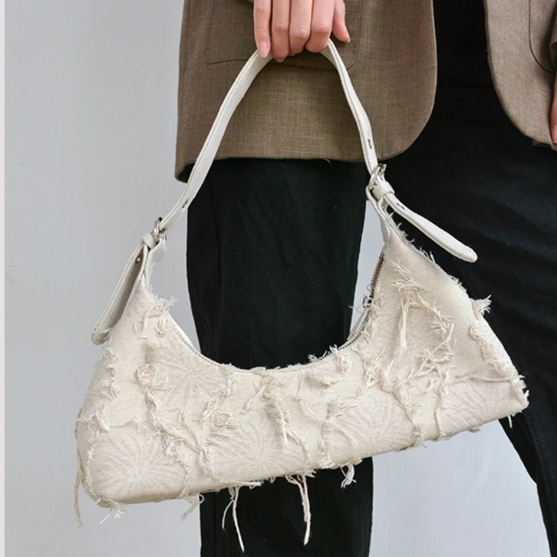 New Fashion Style Tassel Washed Cloth Canvas Bag Stitching Underarm Bag for Women Popular Simple Shoulder Bags Ladies Handbags
New Fashion Style Tassel Washed Cloth Canvas Bag Stitching Underarm Bag for Women Popular Simple Shoulder Bags Ladies Handbags