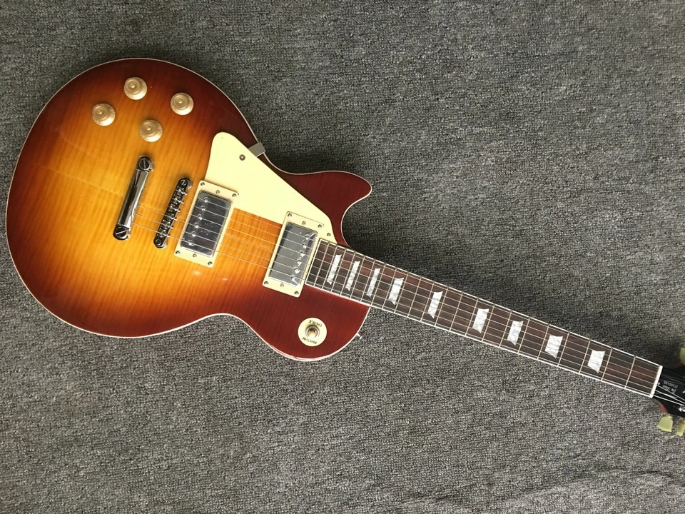 In stock Left hand LP Electric Guitar Mahogany Body Flamed Maple Top Rosewood Fingerboard Block Inlay Brown Gloss Finish Free Sh
In stock Left hand LP Electric Guitar Mahogany Body Flamed Maple Top Rosewood Fingerboard Block Inlay Brown Gloss Finish Free Sh