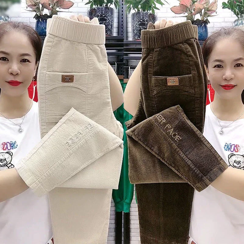 Spring women Letter embroidery corduroy harem pants mom high waist loose style trousers female elegant vintage pant
Spring women Letter embroidery corduroy harem pants mom high waist loose style trousers female elegant vintage pant