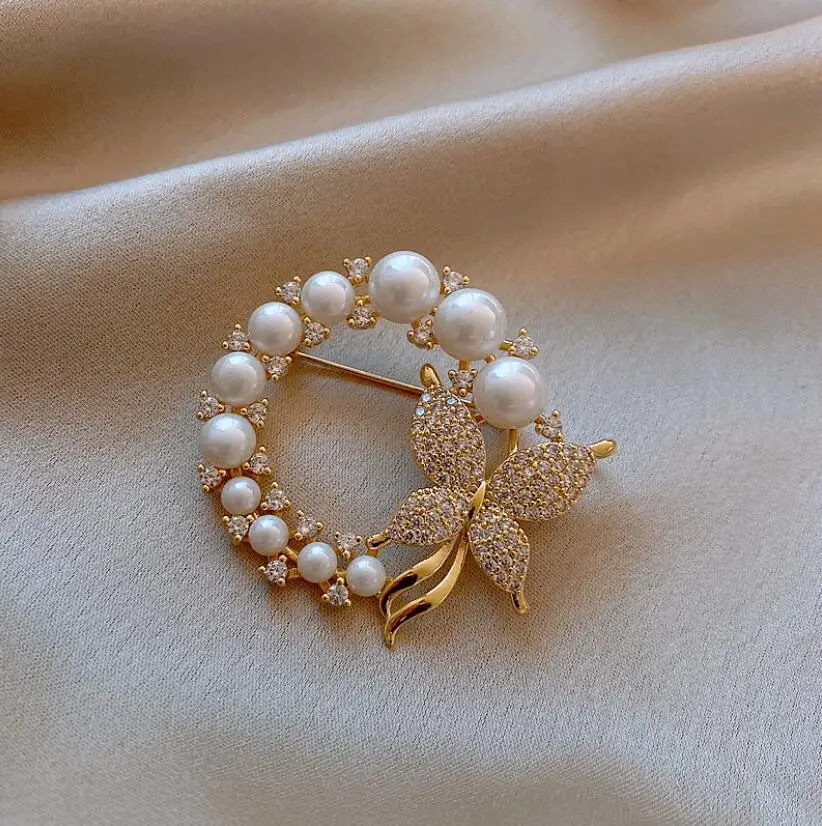 Diamond pearl butterfly brooch artistic temperament net red fashion personality fixed clothing accessories
Diamond pearl butterfly brooch artistic temperament net red fashion personality fixed clothing accessories