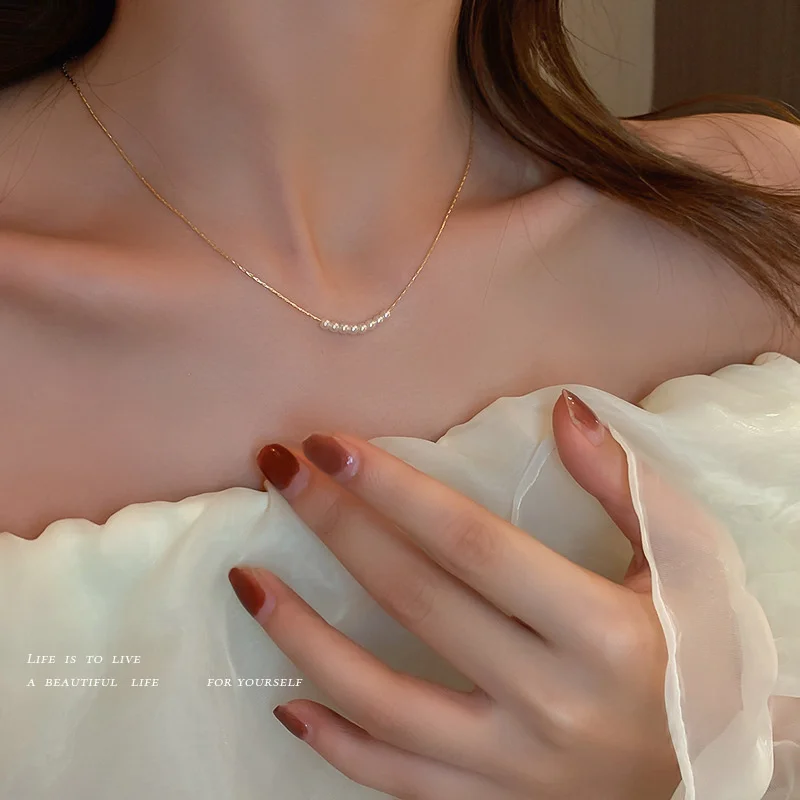 Korean simple pearl geometric Necklace women's thin chain, minority light luxury clavicle chain, cold wind temperament, 
Korean simple pearl geometric Necklace women's thin chain, minority light luxury clavicle chain, cold wind temperament,