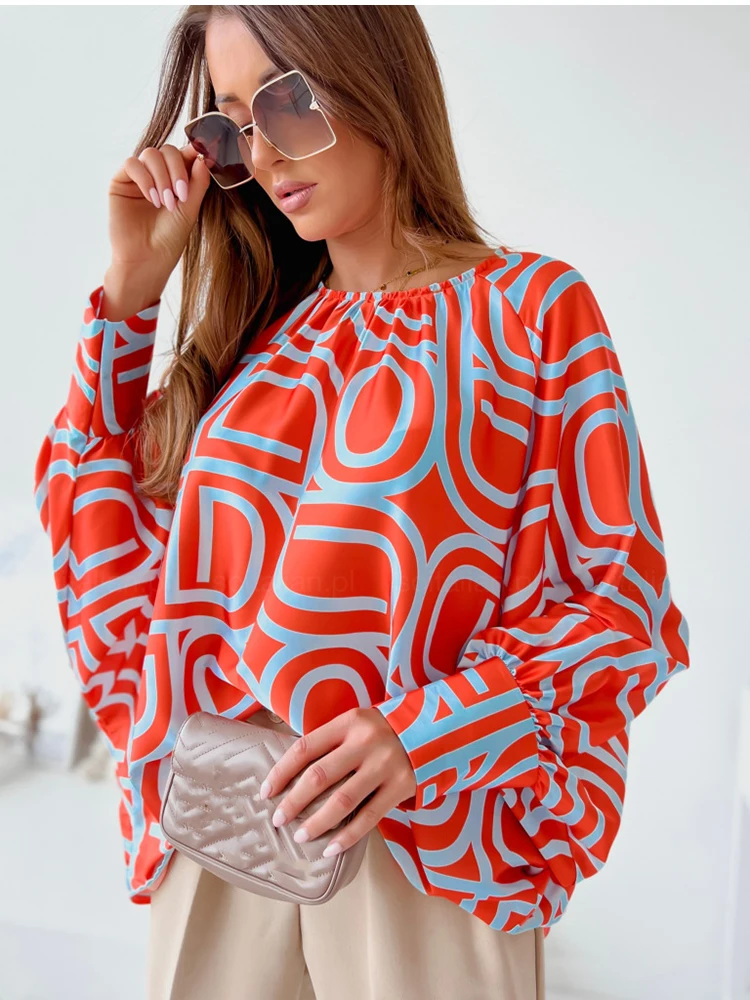 Женская блузка с круглым вырезом, рукавом летучая мышь и принтом
Женская блузка с круглым вырезом, рукавом летучая мышь и принтом