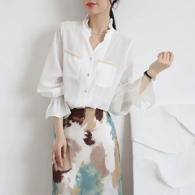 Spring Ruffle Elastic Sleeve Blusas Femininas Elegant Pocket Beaded White Shirt Top Mujer Classic Style Long Sleeve Shirt Women
Spring Ruffle Elastic Sleeve Blusas Femininas Elegant Pocket Beaded White Shirt Top Mujer Classic Style Long Sleeve Shirt Women