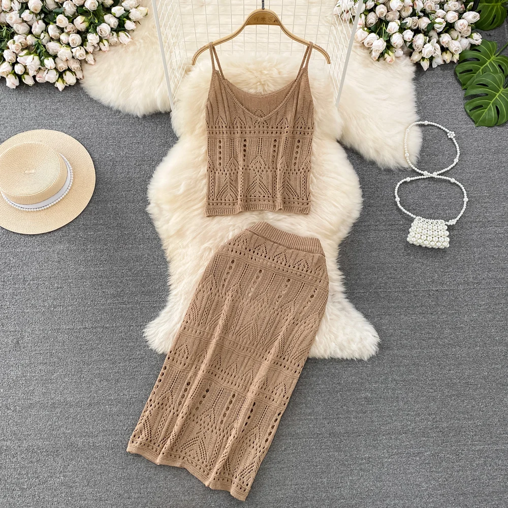 Foamlina сексуальный вязаный комплект из 2 предметов женский модный летний короткий топ без рукавов и юбка миди с эластичным поясом 
Foamlina сексуальный вязаный комплект из 2 предметов женский модный летний короткий топ без рукавов и юбка миди с эластичным поясом