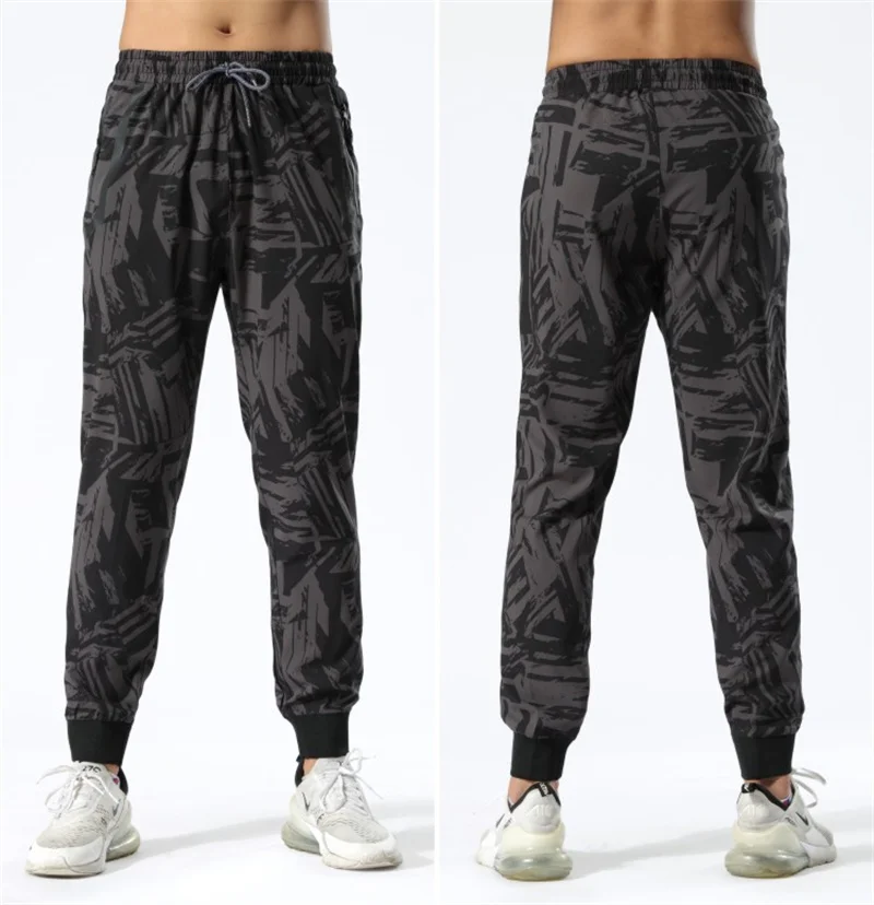 Men Fitness Pants Zipper Pockets Athletic Camouflage Running Pants Training sport Pants Elasticity Legging jogging Gym Trousers
Men Fitness Pants Zipper Pockets Athletic Camouflage Running Pants Training sport Pants Elasticity Legging jogging Gym Trousers