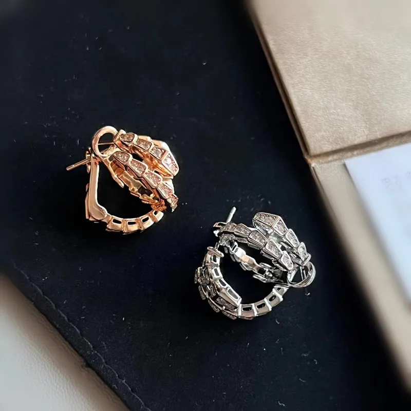 Europe and the United States 925 silver gold plated high-grade diamond snake bone earrings luxury female fashion brand jewelry g
Europe and the United States 925 silver gold plated high-grade diamond snake bone earrings luxury female fashion brand jewelry g