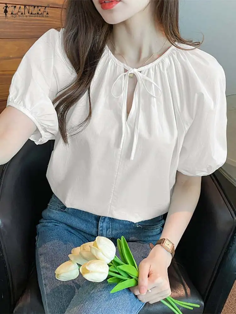 2023 ZANZEA Summer Woman O Neck Puff Sleeve Tops Korean Fashion Blouse Elegant Lace Up Chemise Female Casual Holiday ShirtTunic
2023 ZANZEA Summer Woman O Neck Puff Sleeve Tops Korean Fashion Blouse Elegant Lace Up Chemise Female Casual Holiday ShirtTunic