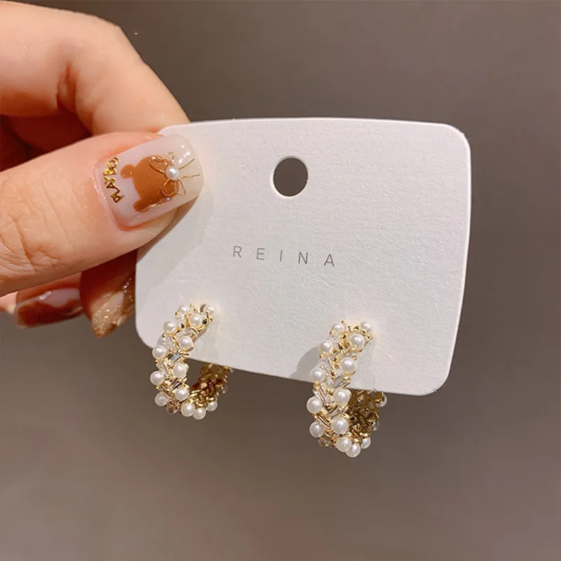 925 Silver Needle Simple Pearl Zircon Earrings Korean Fashion C-shaped Temperament Network Red Lady
925 Silver Needle Simple Pearl Zircon Earrings Korean Fashion C-shaped Temperament Network Red Lady
