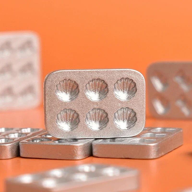 Набор из 10 силиконовых мини-форм для выпечки для кукольного домика
Набор из 10 силиконовых мини-форм для выпечки для кукольного домика