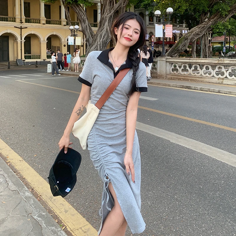 Polo collar dress women's summer Korean version 2022 new slim fit slim drawstring pure style split short sleeved skirt
Polo collar dress women's summer Korean version 2022 new slim fit slim drawstring pure style split short sleeved skirt